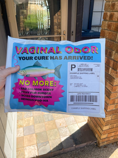 Point of view of someone reading their Vaginal Odor prank package on their doorstep. Hilarious text reads, "No more sad salmon scent, itchy fur burger, scabs downtown, heinous hoo-ha"