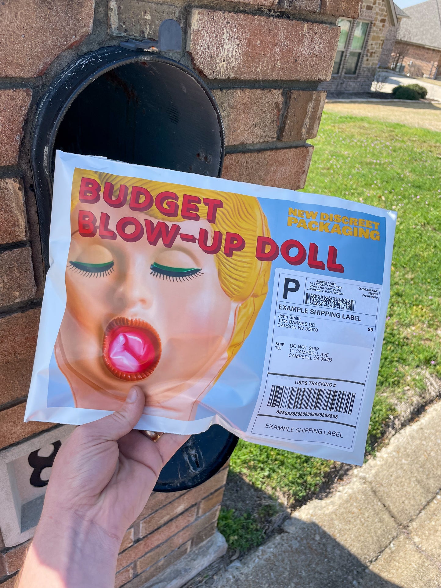 POV of someone opening their mailbox to find a large Blow-Up Doll fake mail prank in their mailbox. Hilarious!